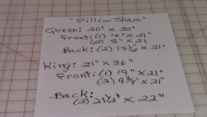 Cut fabric for the front (one large piece), and two smaller side pieces. Cut two pieces for the back. (Dimensions provided in the video based on the chosen pillow size)