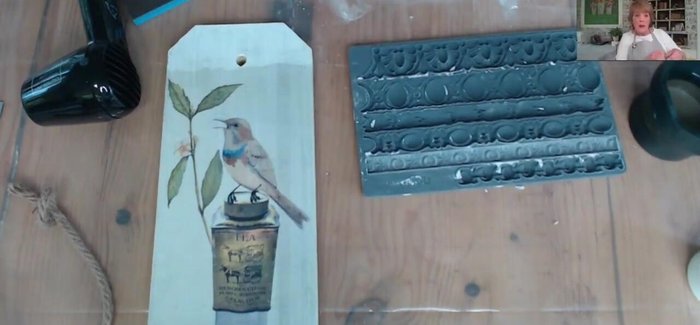 Trim excess silicone mold material from the tag.