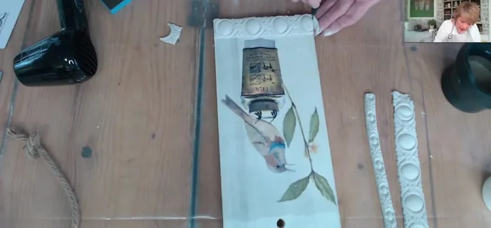 Trim excess silicone mold material from the tag.