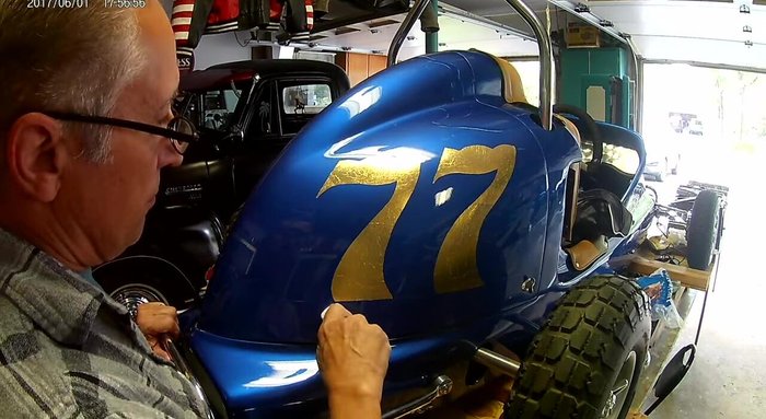 Use a fresh cotton ball to lightly spin and score the gold leaf, adding shimmer and a nice touch. Overlap circles slightly for a better look.