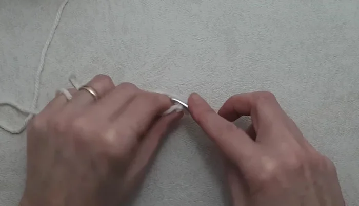 Work three double crochet in the ring.