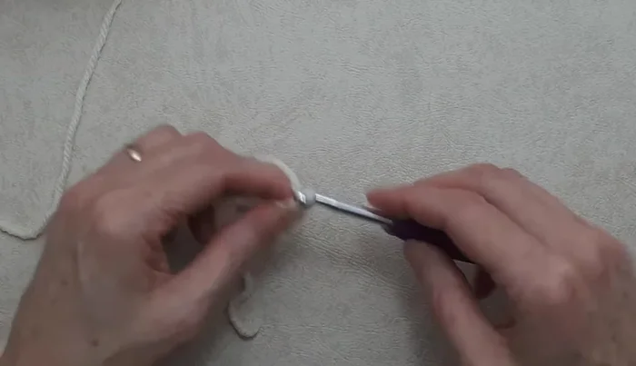 Work three double crochet in the ring.