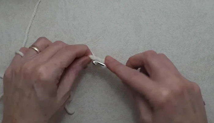 Work three double crochet in the ring.