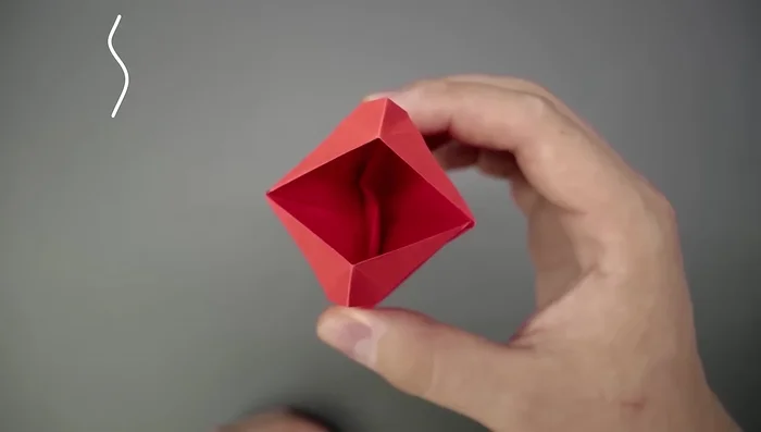 To improve the mouth closure, bend the inside paper to create an 'S' shape or simply bend it to the side.