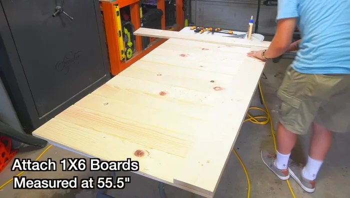 Attach the 1x6 standard boards to the front of the headboard using wood glue and brad nails for a clean look.