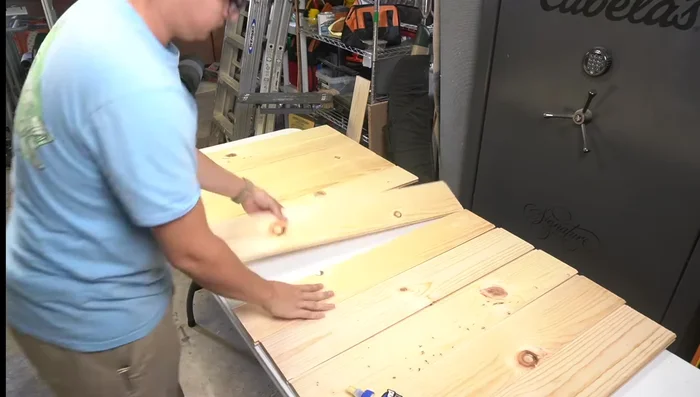 Cut off the end tongue of the final glued board to create a flush surface for attaching other components.