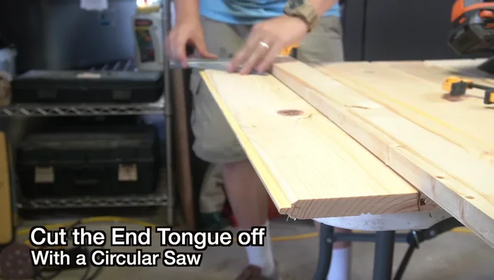 Cut off the end tongue of the final glued board to create a flush surface for attaching other components.