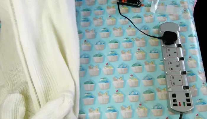 Add optional handles (e.g., from old belts).