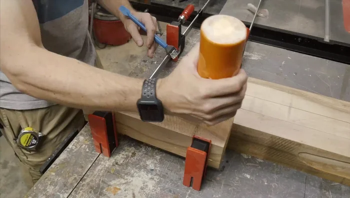 After the glue dries, remove excess glue squeeze-out with a scraper. Sand the knife block using 150-grit and then 220-grit sandpaper.