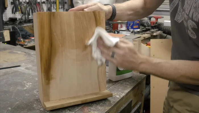 Apply a thick coat of 100% pure tung oil to the entire knife block, including the slots at the top.