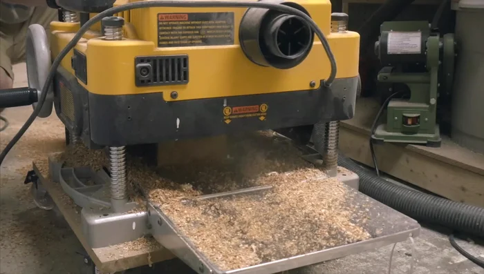 Clean up one end of the board using a chop saw.