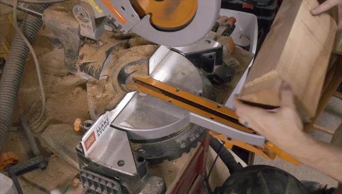 Clean up one end of the board using a chop saw.