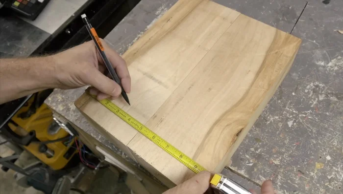 Reassemble the pieces in the correct order. Mark the location for the knife slots.