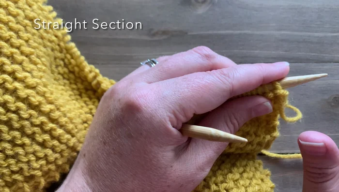Straight section: Knit the first stitch, then knit two together (K2tog) at the beginning of each row to decrease. Knit across remaining stitches. Alternate decrease rows (K1, K2tog, knit across) and increase rows (K1fb, knit across) for 30 rows.