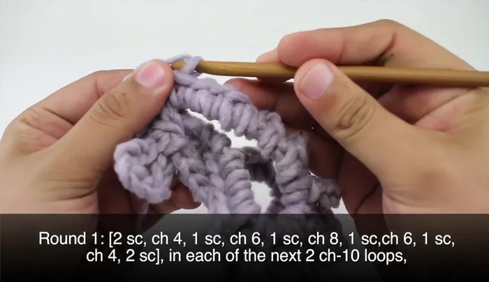 Body: In each small loop, work 2 single crochets, chain 4, single crochet, chain 6, single crochet, chain 8, single crochet, chain 6, single crochet, chain 4, single crochet, single crochet. Repeat for all small loops.