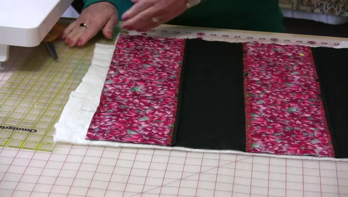 Clip corners: Make small snips into the corners of the seam allowance, being careful not to cut the stitches.