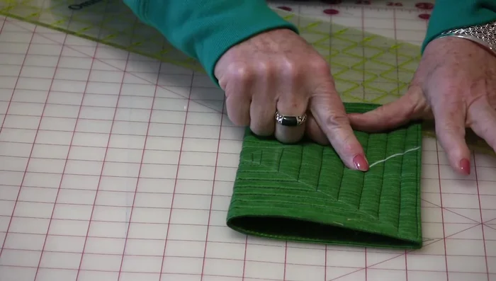 Optional finishing: Secure the corners by hand-stitching or top-stitching. Add embellishments like buttons if desired.