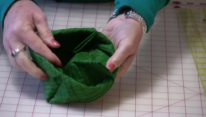 Optional finishing: Secure the corners by hand-stitching or top-stitching. Add embellishments like buttons if desired.