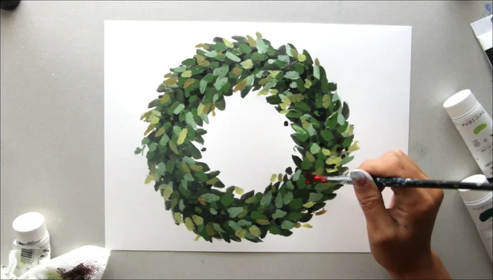 Add brighter red berries for contrast and visual interest.