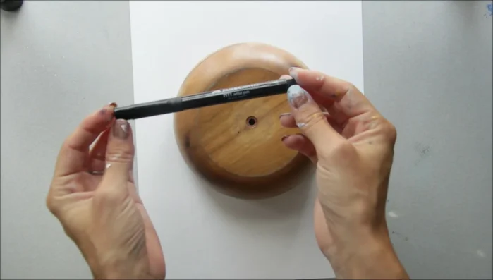 Outline the circle with a pen or pencil. (If using a pencil, the lines will wash away)