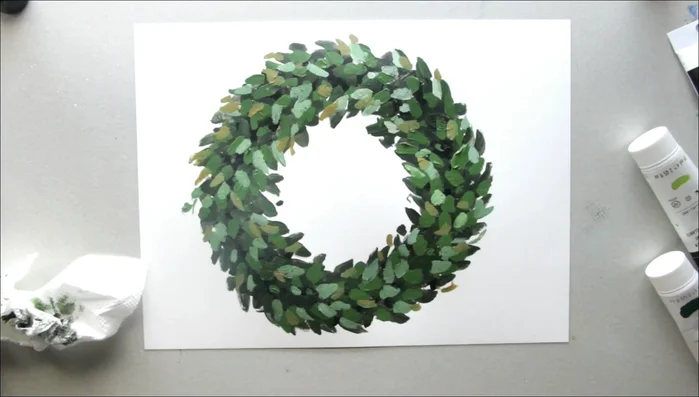 Add highlights with a very light yellow-green-white mix to create contrast and make the wreath pop.
