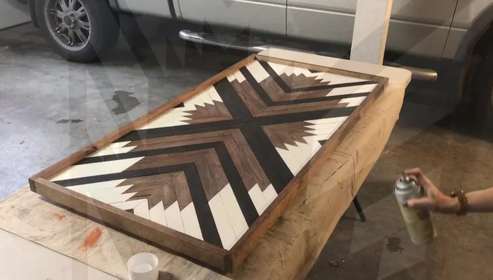 Protect the sign with spray-on shellac.