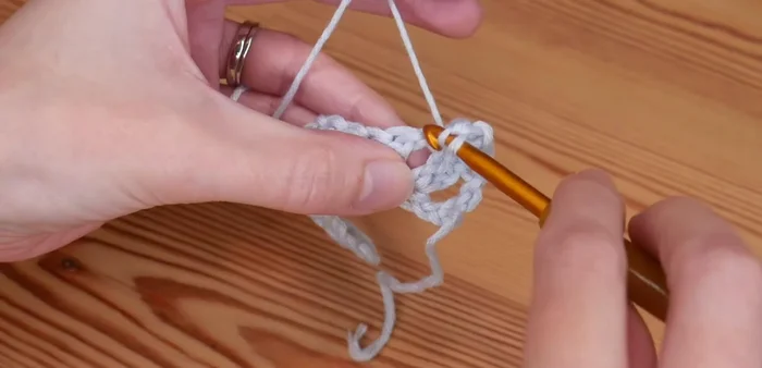 Skip to the next chain-one space, and repeat steps 4 and 5 from the previous row. Continue this until the end of the row.