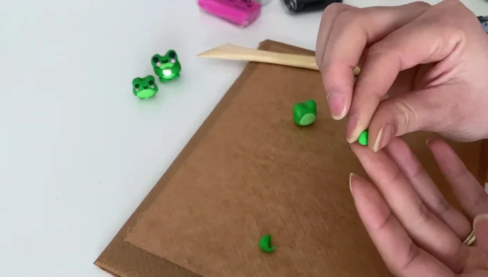 Create small balls for the feet.