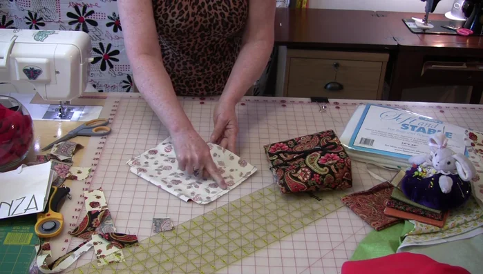 Insert the outer bag into the lining, matching seams. Stitch close to the Soft & Stable around the top.