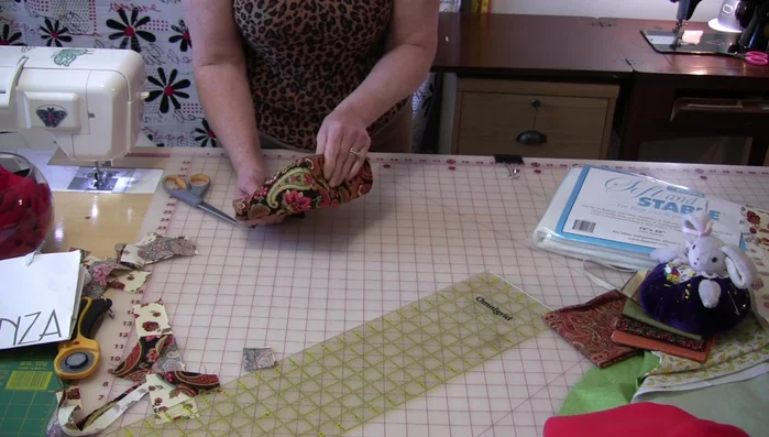 Press seams. Use steam to press handles, avoiding direct iron contact.