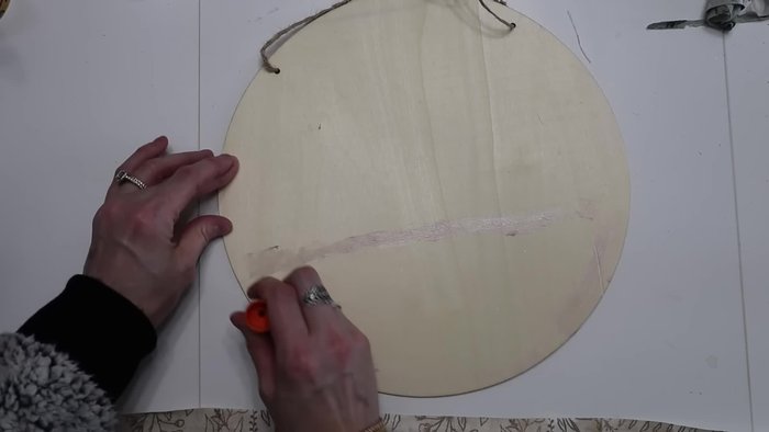 Trim excess fabric once the Mod Podge is dry.