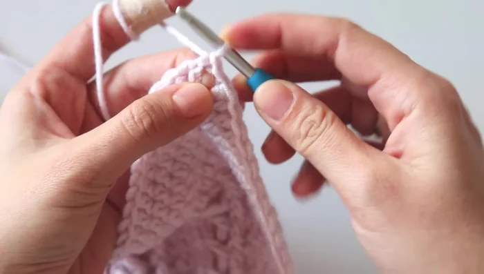 Finish with a crab stitch border for added texture and detail.