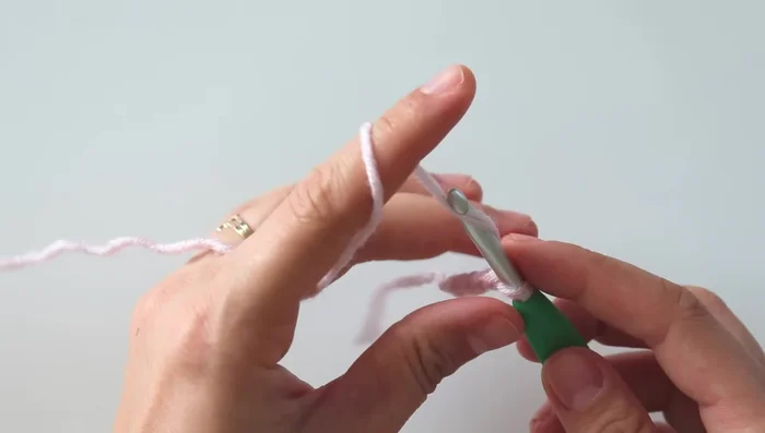 Cast on 100 chains. Skip the first chain and starting from the second, single crochet across.