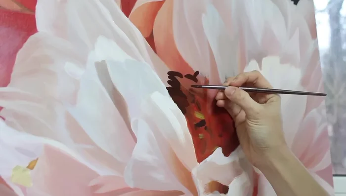 Paint the center of the peony, using a variety of colors and values for realism.