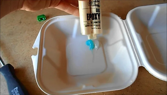 Mix epoxy according to package directions.