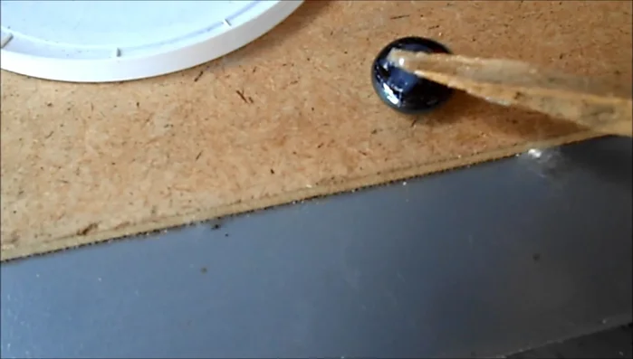 Continue placing beads, working from the center outwards, following your design.