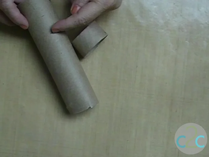 Paint the outside and inside edges of each napkin ring base.