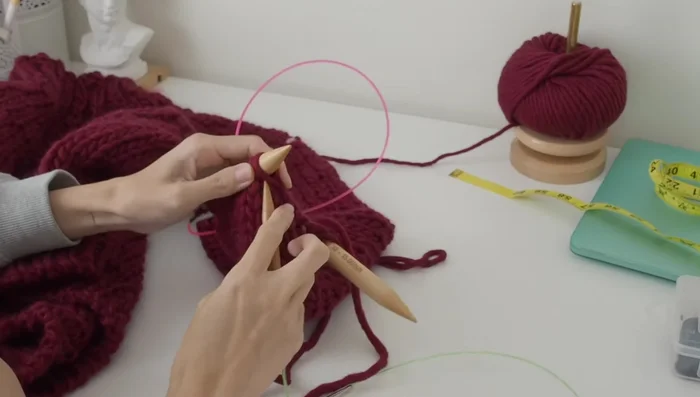 Bind off the cuff using the tubular bind off method.