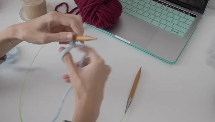 Work one by one rib in the round.