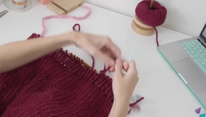 Bind off the hem using the tubular bind off method.