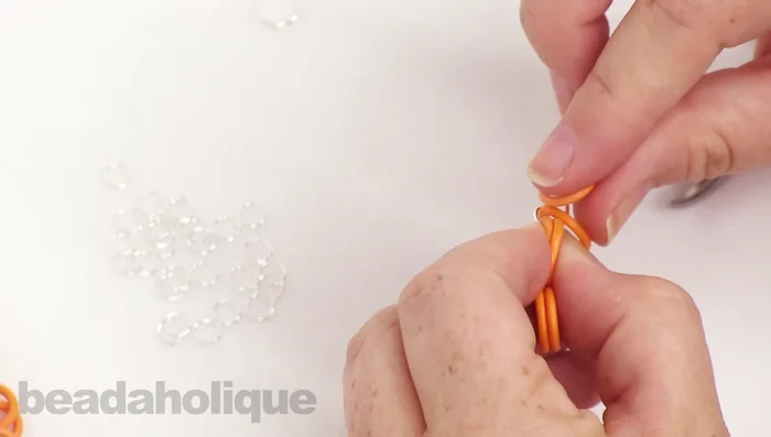 Close the second jump ring.