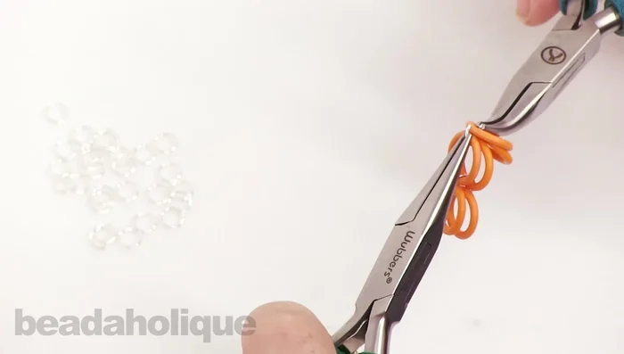 Close the second jump ring.