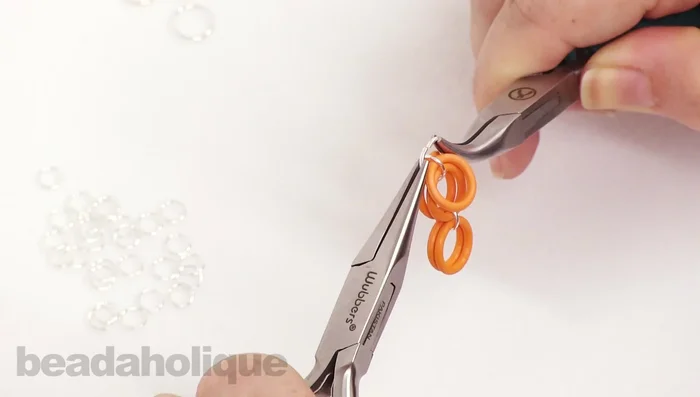 Close the 10mm jump ring, ensuring it's flush and secure.