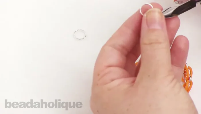 Close the 10mm jump rings, completing the bracelet.