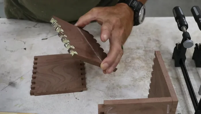 Glue up the box: Liberally apply glue to the box joints and carefully assemble the sides, wiping off excess glue with a wet rag. Clamp securely and let dry overnight.