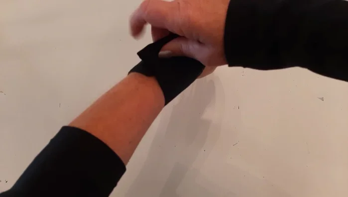 Remove existing buttons from the cuff. Note the buttonhole positions for later replacement.