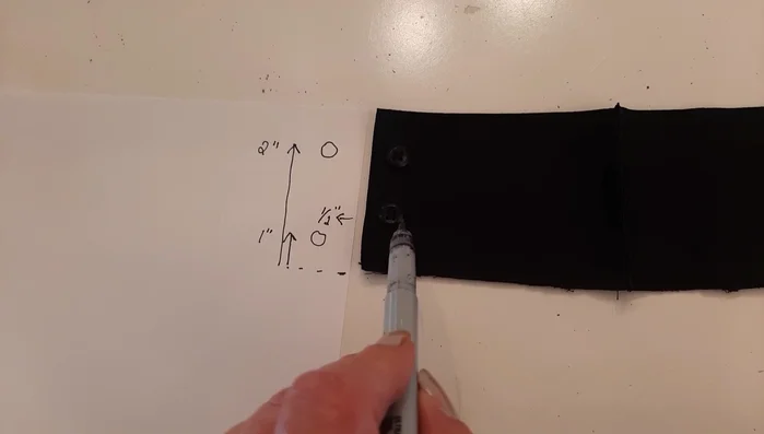 Remove existing buttons from the cuff. Note the buttonhole positions for later replacement.