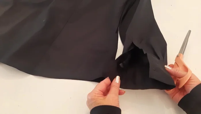 Remove existing buttons from the cuff. Note the buttonhole positions for later replacement.