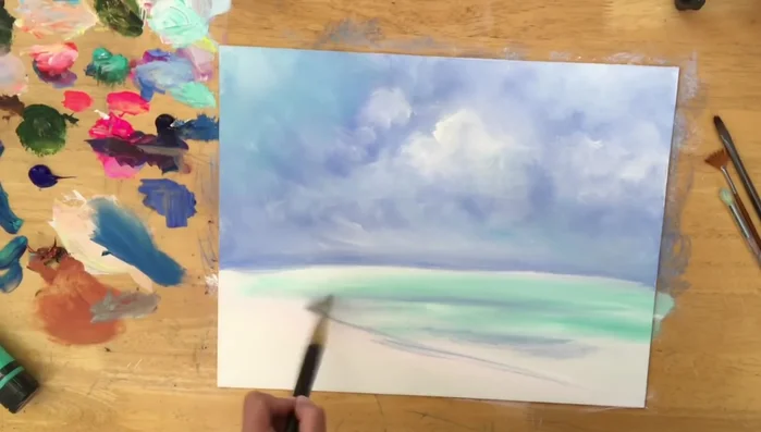 Add a hint of light blue violet for shadows in the sand.