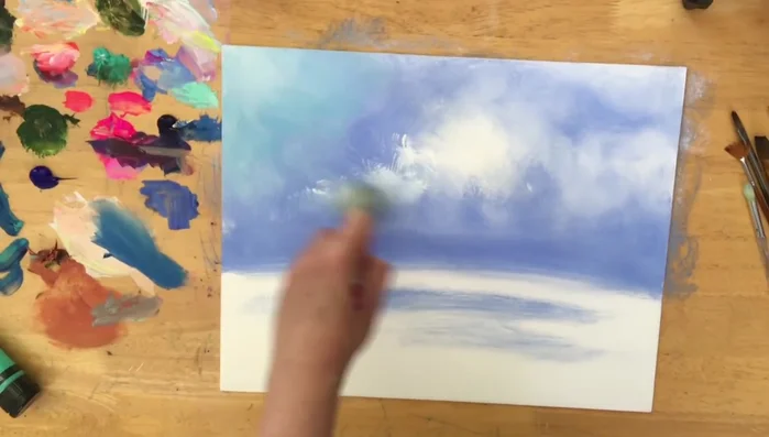 Add hints of sky blue to the clouds and horizon.